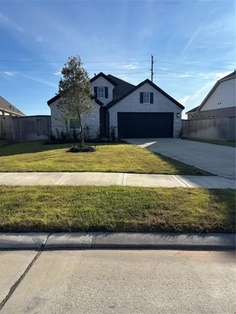 a front view of house with yard