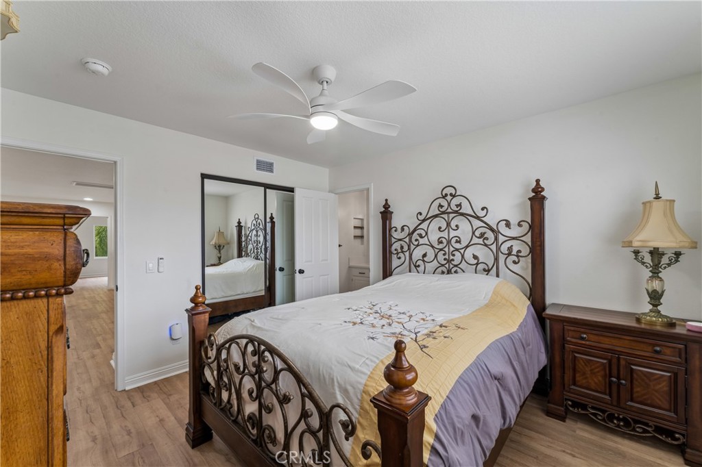 26023 Salinger Lane Stevenson Ranch, CA 91381 - Photo 19 of 35 Large upstairs bedroom featuring ample natural light and spacious layout.