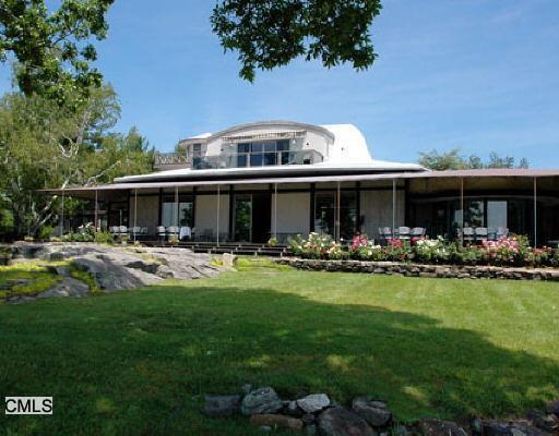 19 Stony Point Road Westport, CT 06880 - Photo 1 of 1 a front view of a house with swimming pool having outdoor seating