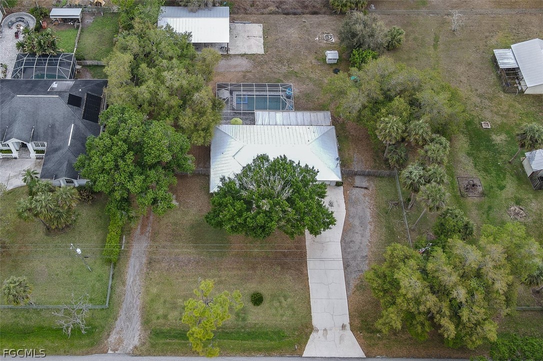 15581 Old Olga Road Alva, FL 33920 - Photo 38 of 38 an aerial view of a house with yard