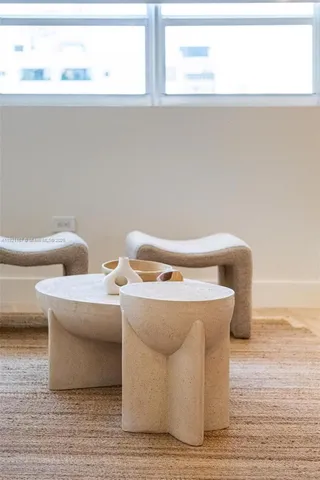 a view of washer and dryer with wooden floor