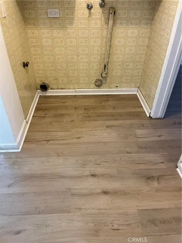 a view of a room with rack on the wall