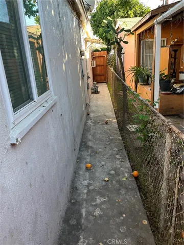 a view of a chairs and table in the patio
