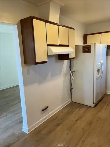 a view of walk in closet with glass window