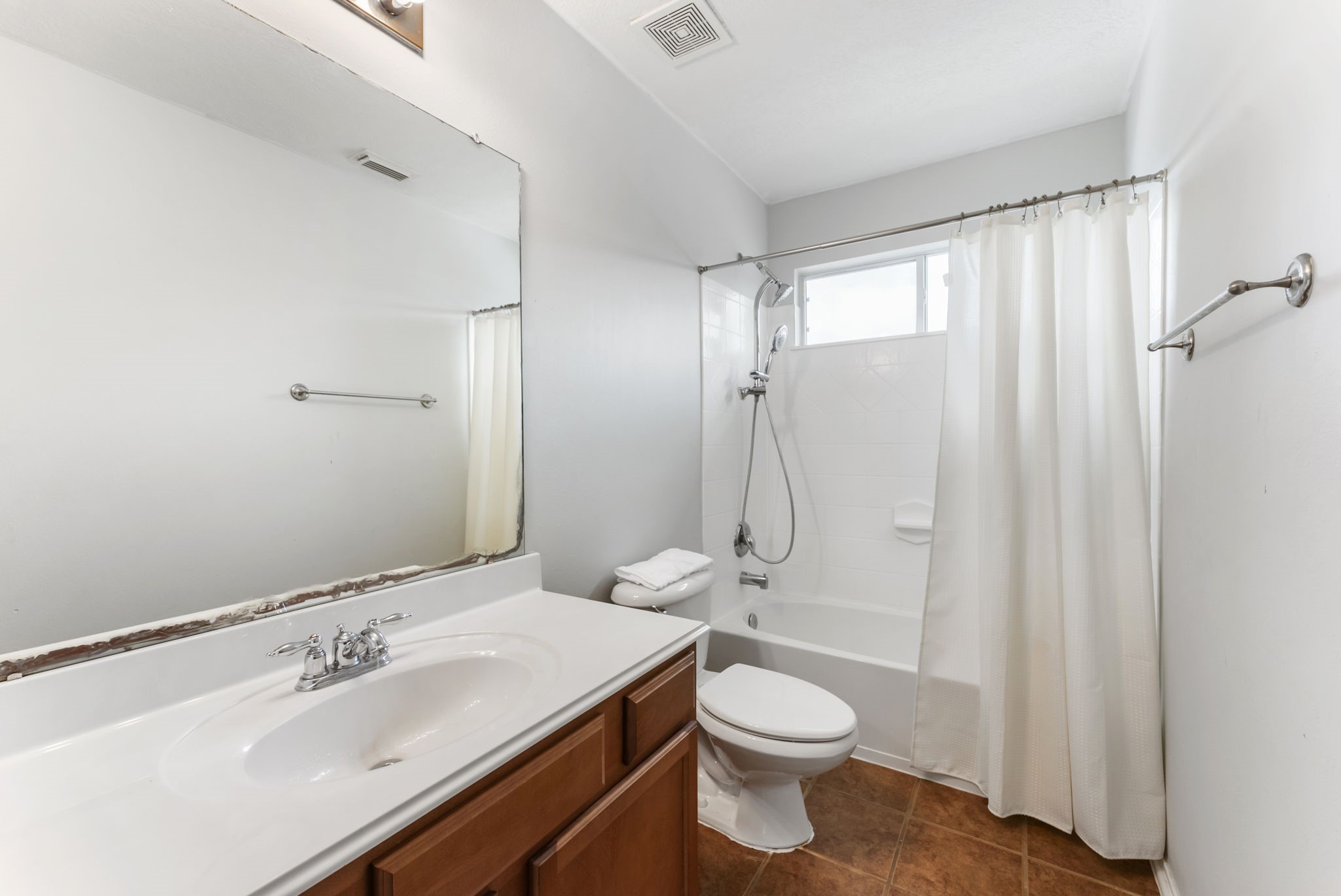 7203 Cool Springs Magnolia, TX 77354 - Photo 26 of 31 a bathroom with a sink a toilet and shower
