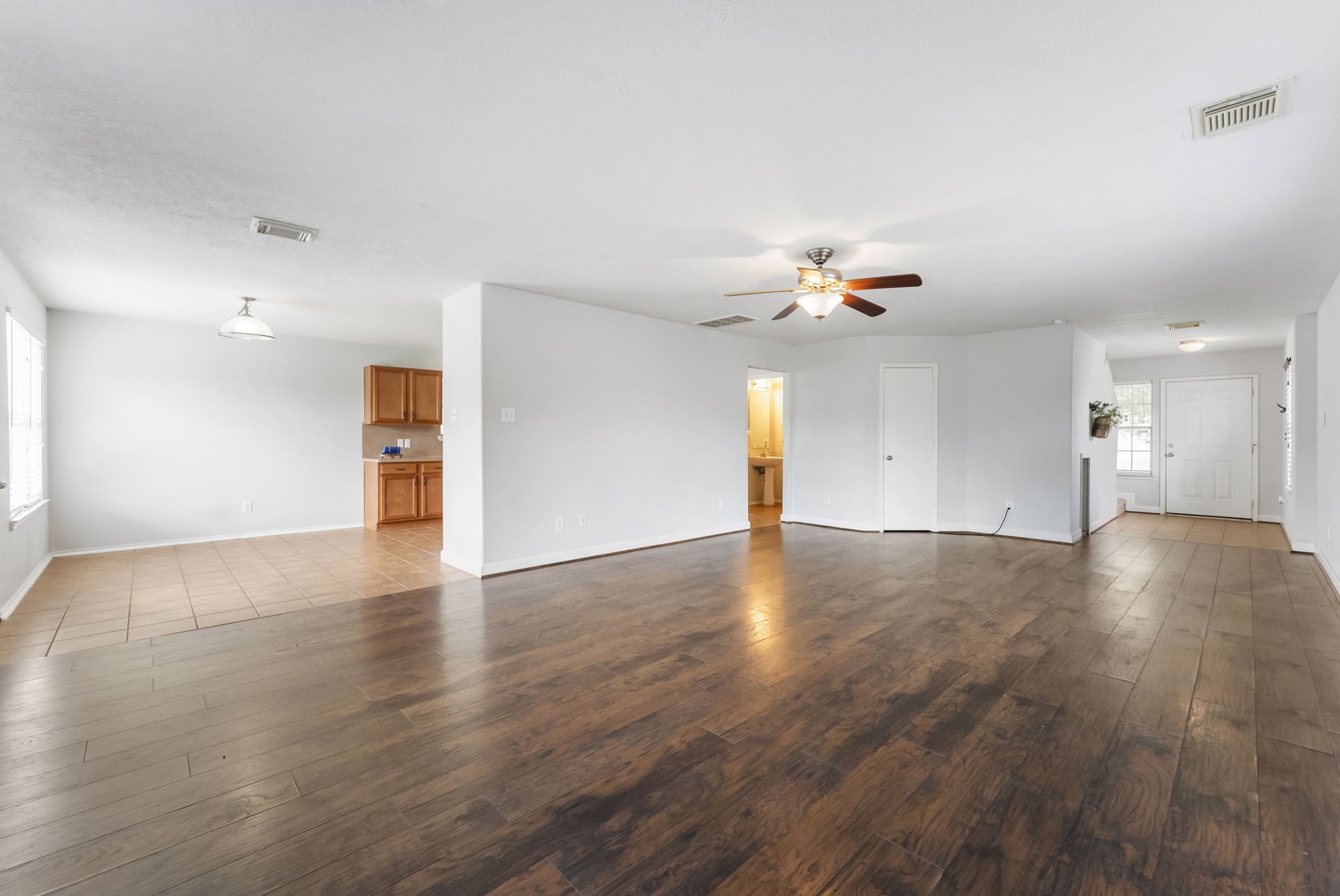 7203 Cool Springs Magnolia, TX 77354 - Photo 8 of 31 a view of empty room with wooden floor