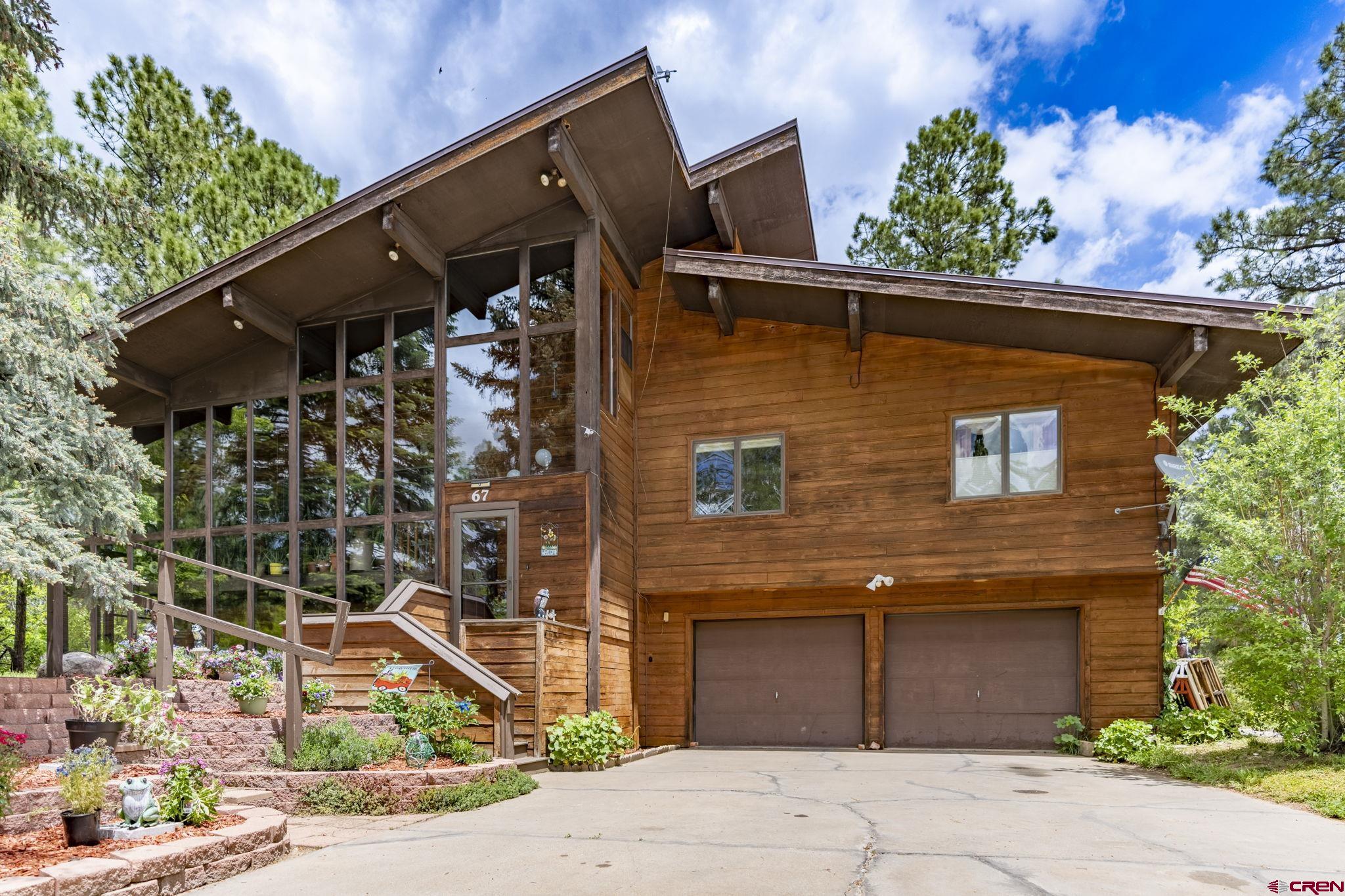 front view of a house with a street