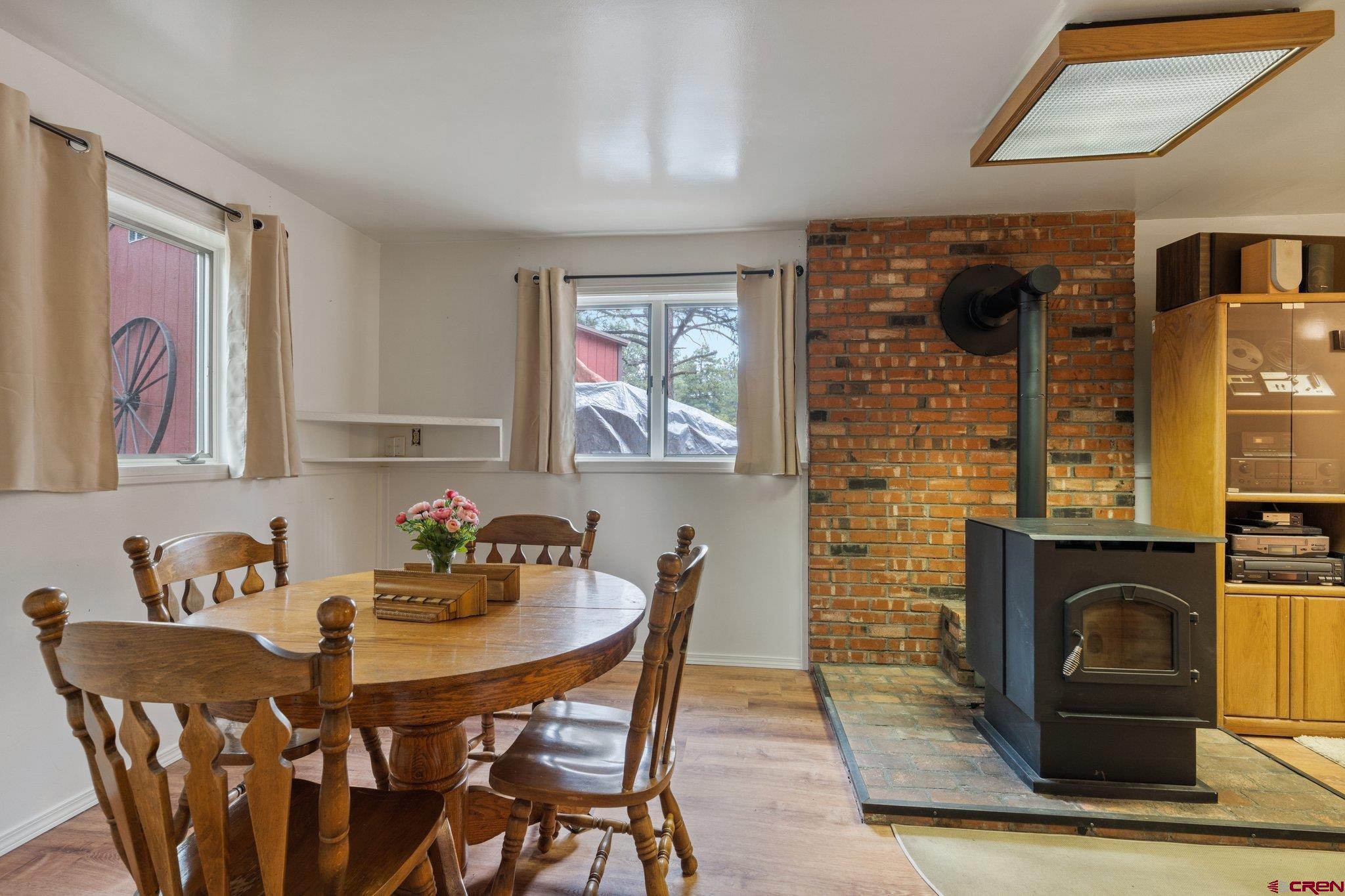 67 Pine Ridge Loop Durango, CO 81301 - Photo 29 of 35 a dining room with furniture and window