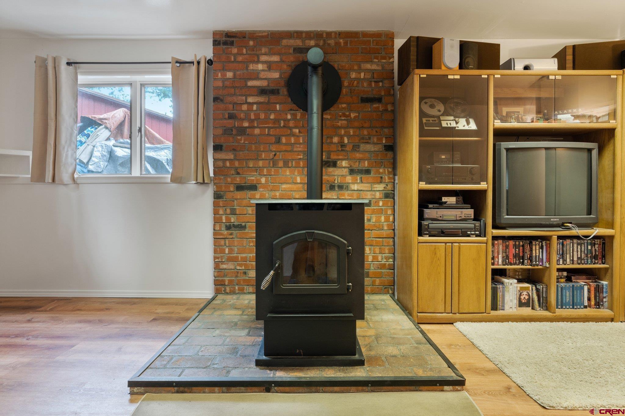 67 Pine Ridge Loop Durango, CO 81301 - Photo 31 of 35 a view of a fireplace with glass windows