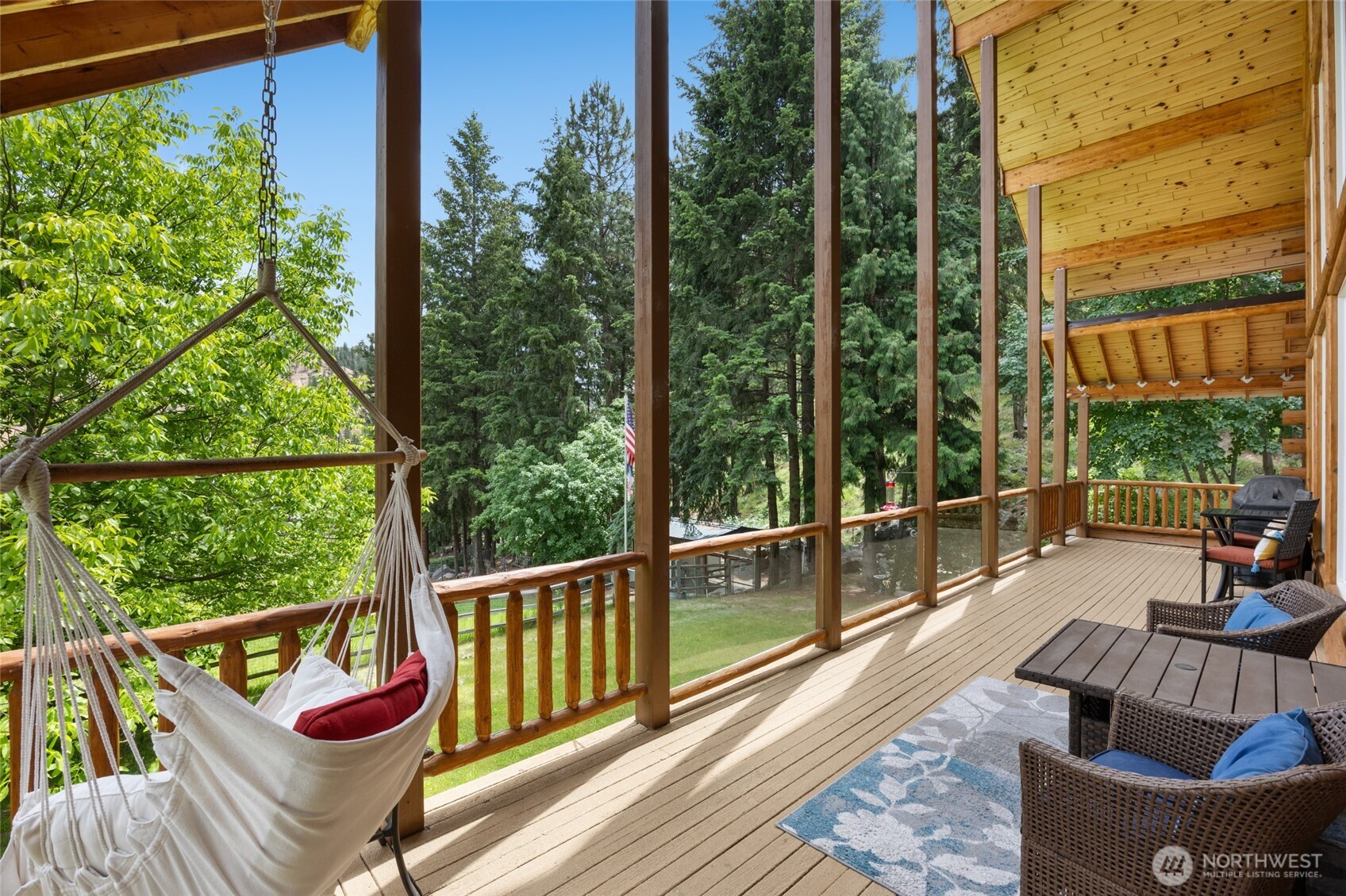 11125 Entiat River Road Entiat, WA 98822 - Photo 22 of 40 a view of roof deck with couches and wooden floor