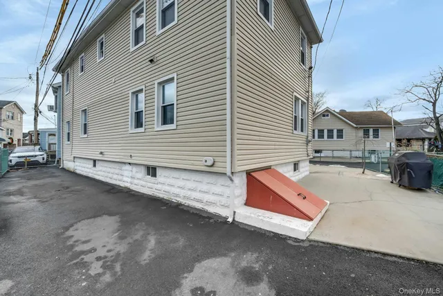 a view of a house with a street