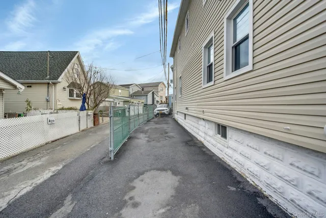 a view of a house with a street