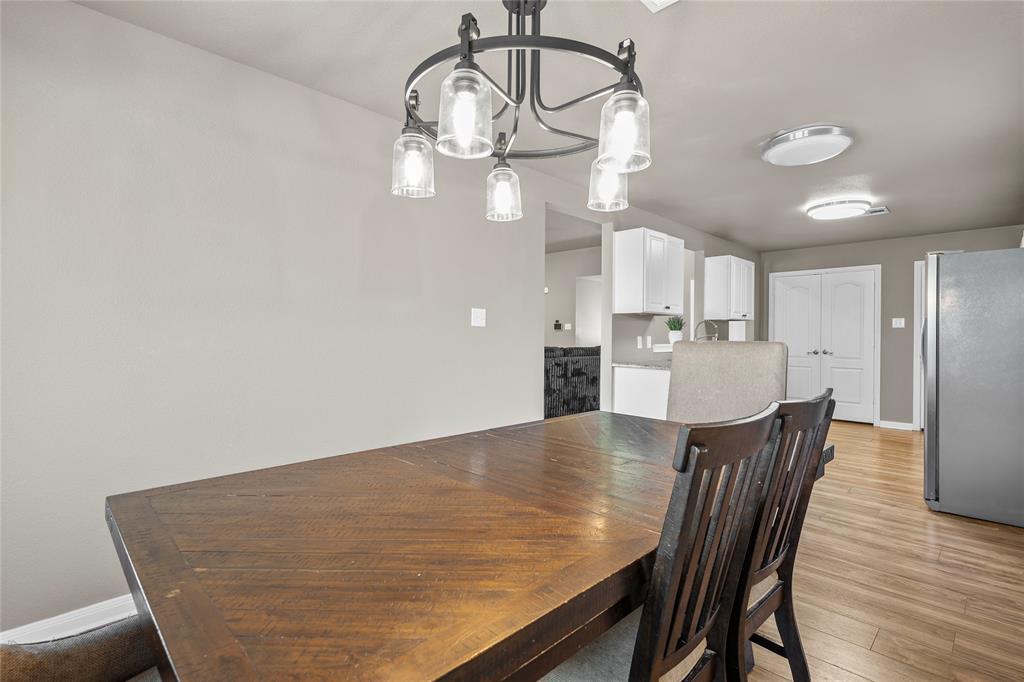 606 Powers Street Lacy-Lakeview, TX 76705 - Photo 11 of 23 a view of a dining room with furniture