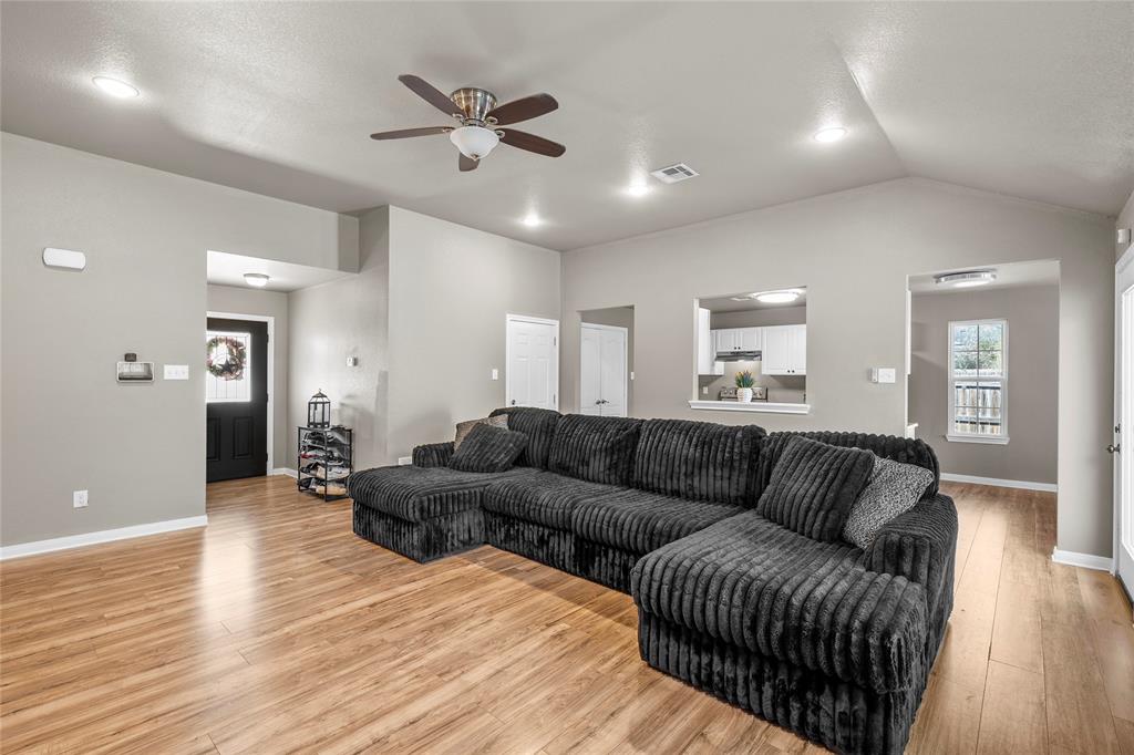 606 Powers Street Lacy-Lakeview, TX 76705 - Photo 4 of 23 a living room with furniture and wooden floor
