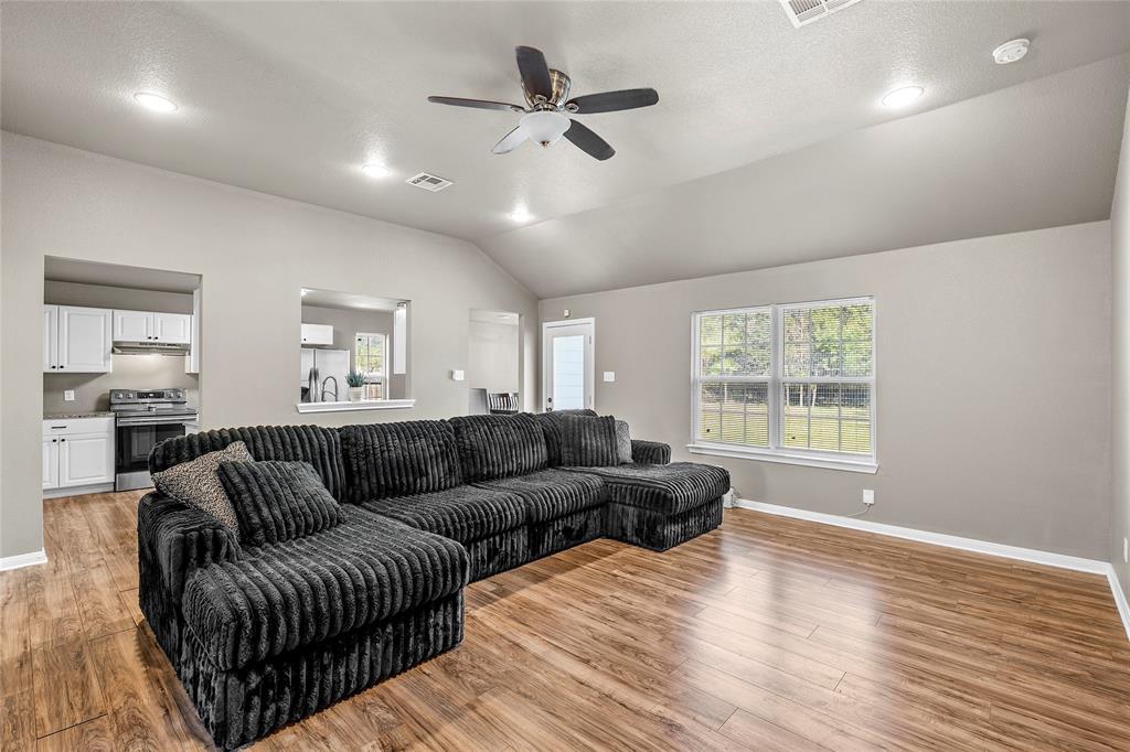 606 Powers Street Lacy-Lakeview, TX 76705 - Photo 6 of 23 a living room with furniture and a large window