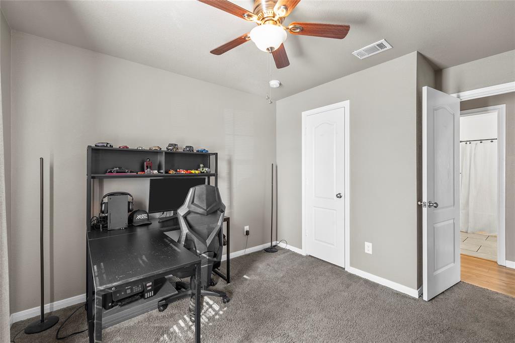 606 Powers Street Lacy-Lakeview, TX 76705 - Photo 9 of 23 a view of a workspace with furniture and a window