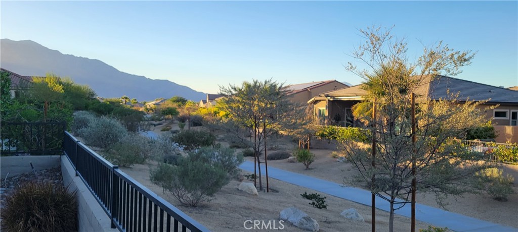82 Burgundy Rancho Mirage, CA 92270 - Photo 30 of 42 Open walking path behind home - West