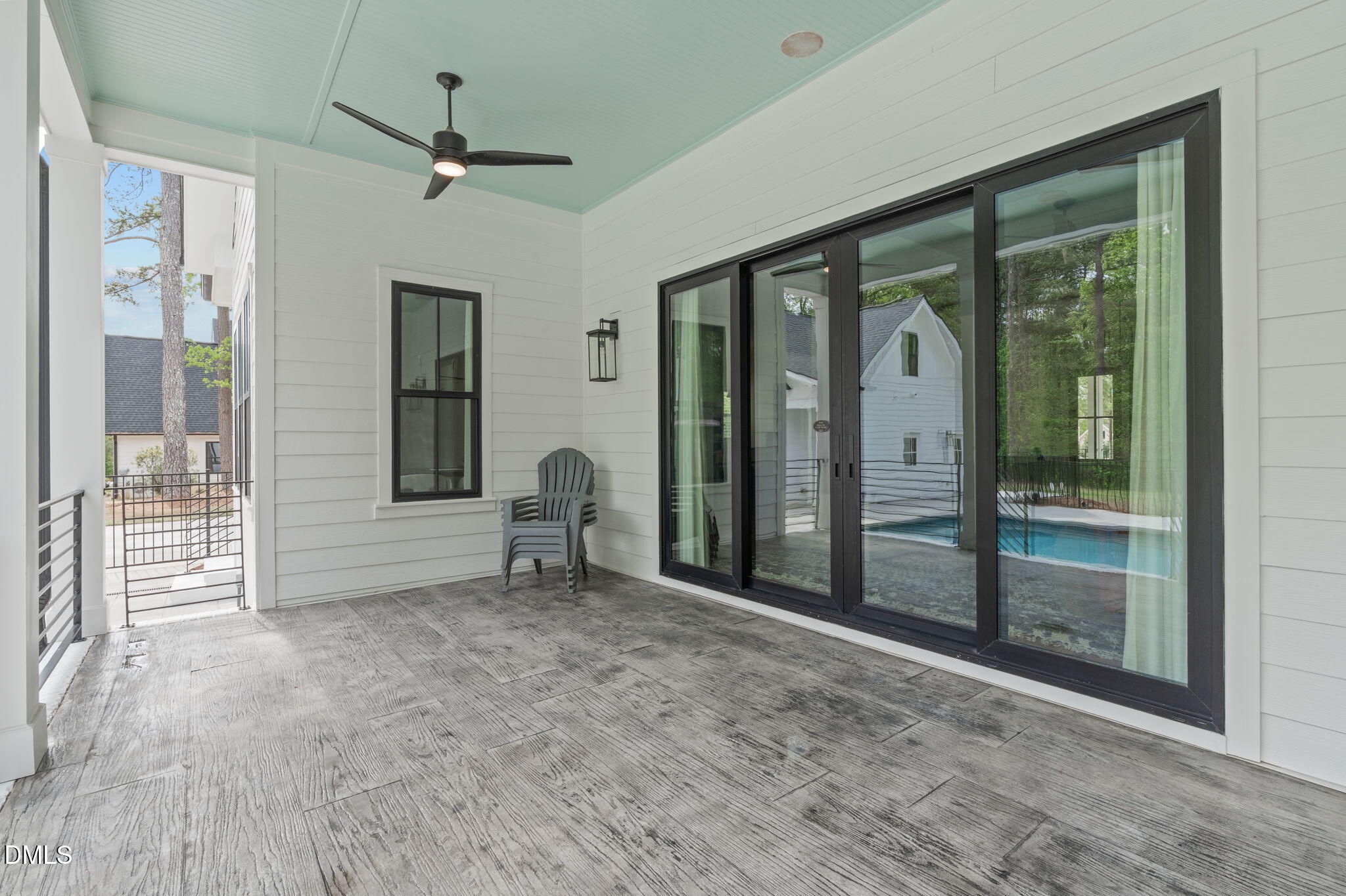 5005 Ten-Ten Road Apex, NC 27539 - Photo 33 of 60 Access from sliding doors in family room, sized to accommodate a variety of furniture styles.
