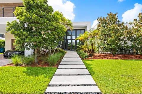 a view of a garden with a fountain