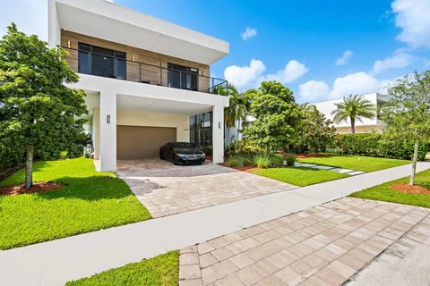 a house view with a garden space