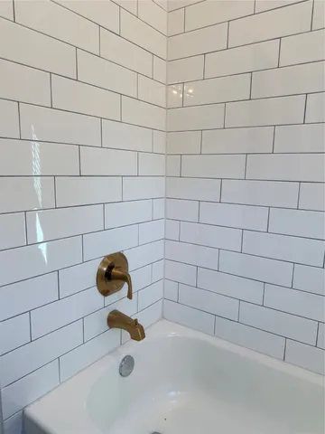 a bathroom with a bathtub