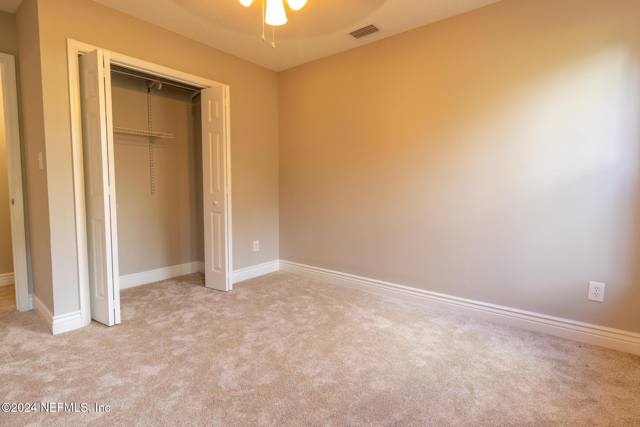 157 Timber Lane Crossing Palatka, FL 32177 - Photo 13 of 16 an empty room with closet area
