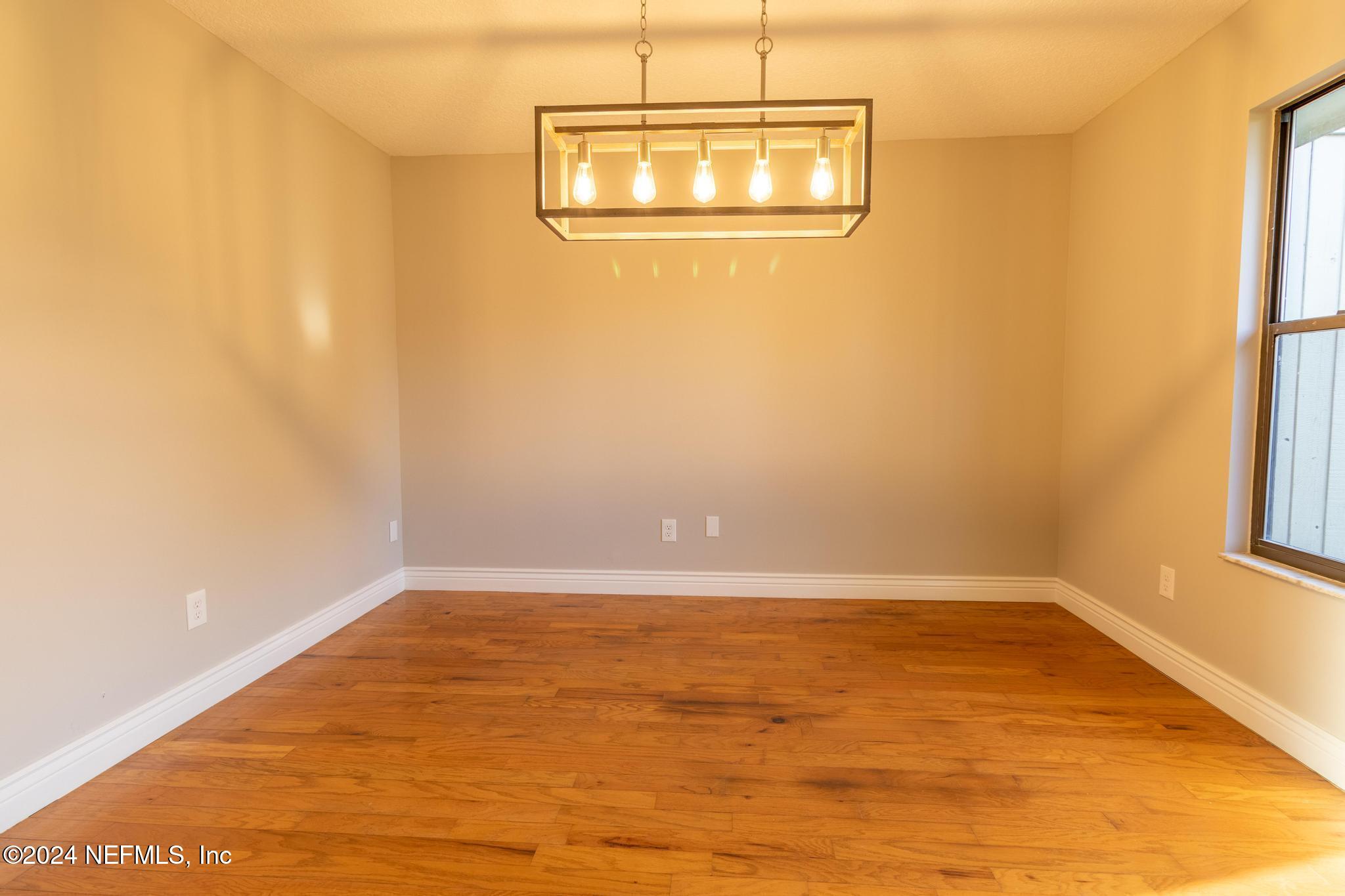 157 Timber Lane Crossing Palatka, FL 32177 - Photo 8 of 16 a view of an empty room with a window