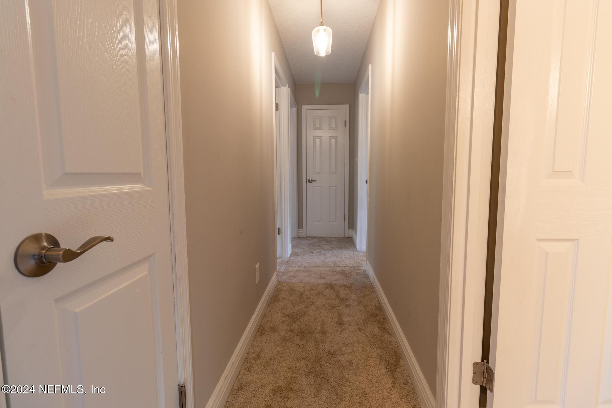 157 Timber Lane Crossing Palatka, FL 32177 - Photo 9 of 16 a view of a livingroom and a bathroom