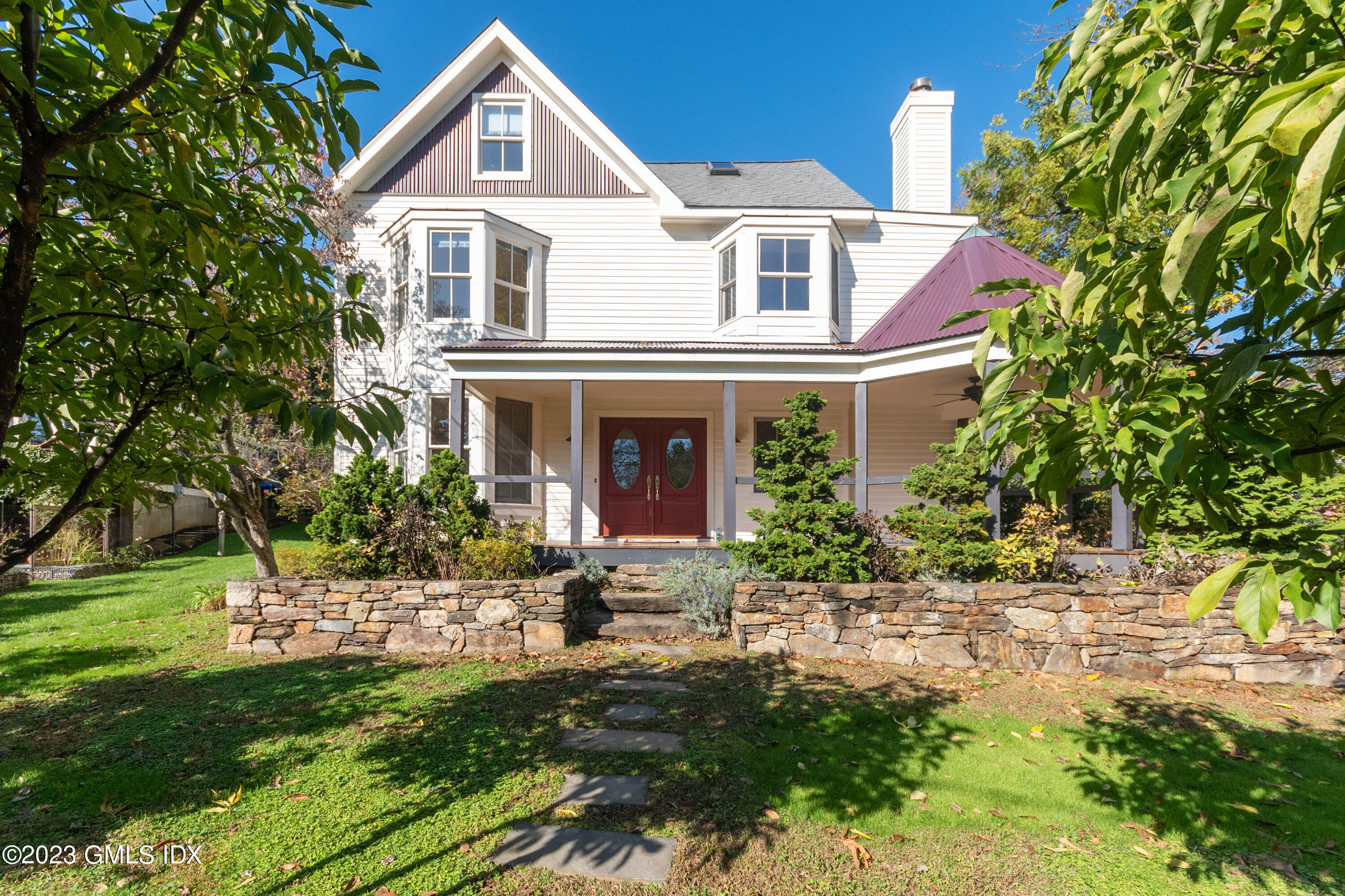 2 Marks Road Riverside, CT 06878 - Photo 1 of 1 a front view of a house with a yard