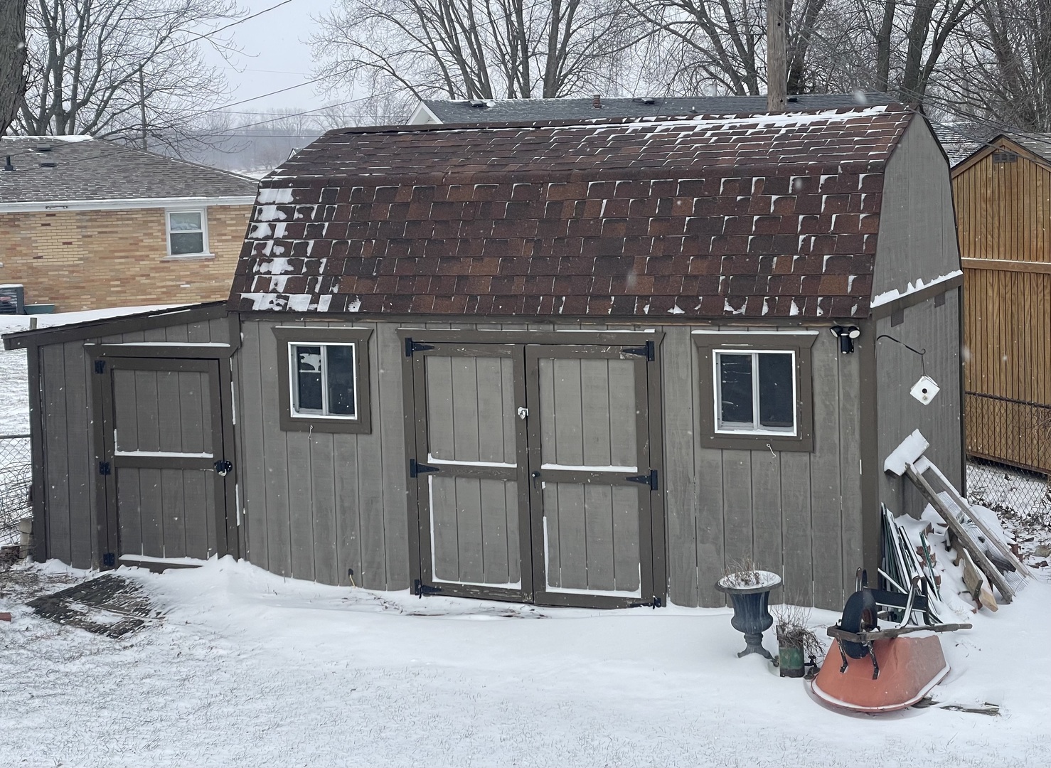 316 South 4000 West Road Kankakee, IL 60901 - Photo 12 of 13 a view of a house with a snow in the yard