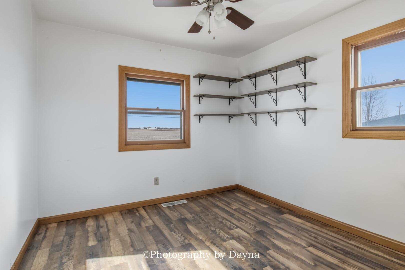316 South 4000 West Road Kankakee, IL 60901 - Photo 13 of 29 a view of a big room with wooden floor and windows