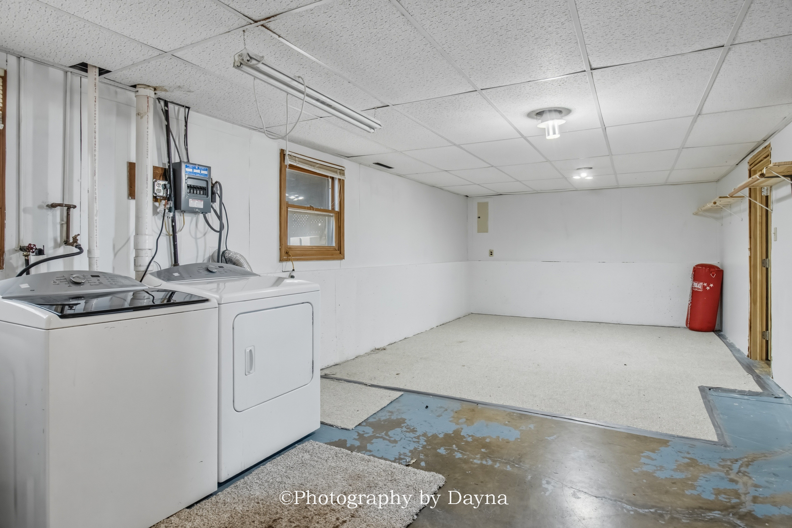 316 South 4000 West Road Kankakee, IL 60901 - Photo 21 of 29 a hallway with a white stove top oven and cabinets