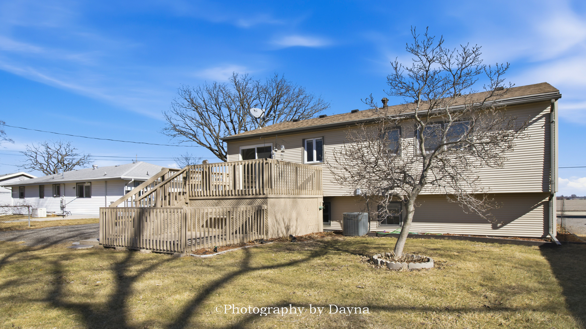 316 South 4000 West Road Kankakee, IL 60901 - Photo 25 of 29 a view of a white house with a yard