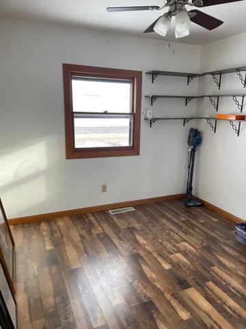 a kitchen with a stove and cabinets