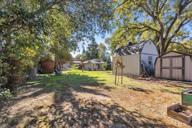 a house with trees in front of it