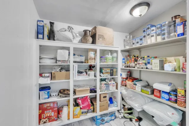 a room with storage and utility