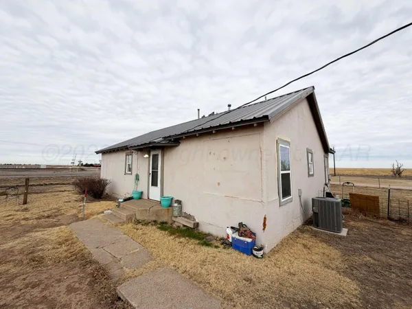a view of a house with a patio