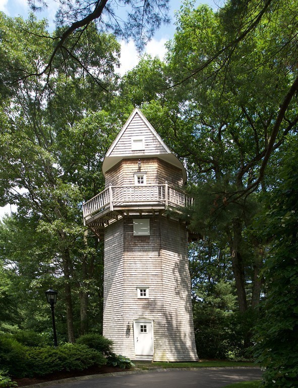 2 Laxfield Road Weston, MA 02493 - Photo 11 of 30 a front view of a house with a yard
