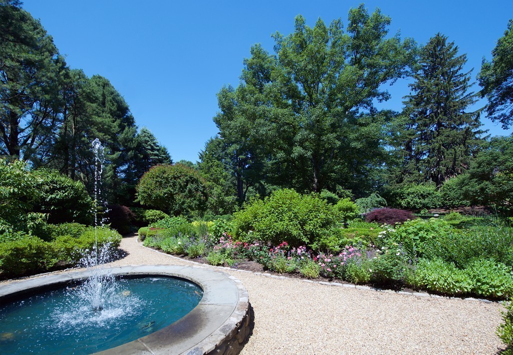 2 Laxfield Road Weston, MA 02493 - Photo 13 of 30 a view of a garden with large trees