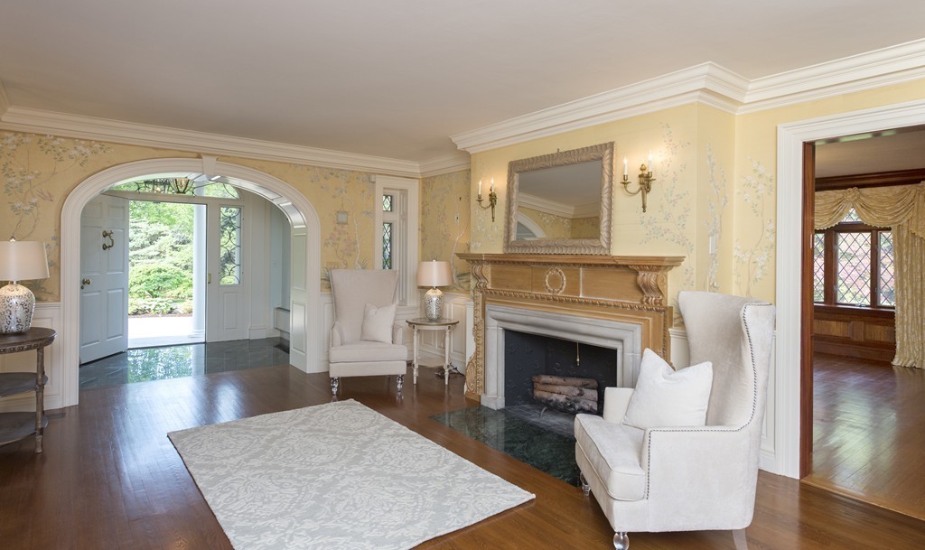 2 Laxfield Road Weston, MA 02493 - Photo 17 of 30 a living room with furniture and a fireplace