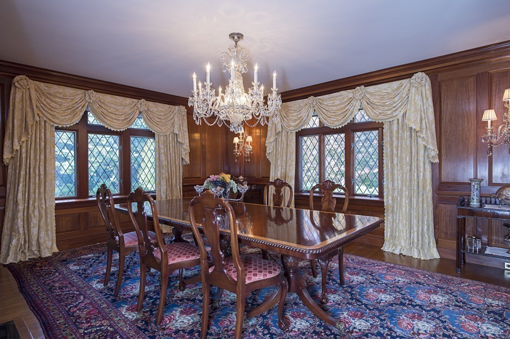 2 Laxfield Road Weston, MA 02493 - Photo 20 of 30 a view of a dining room with furniture a chandelier and wooden floor