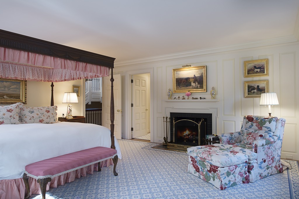 2 Laxfield Road Weston, MA 02493 - Photo 25 of 30 a living room with furniture and a fireplace