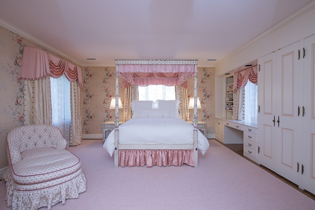 2 Laxfield Road Weston, MA 02493 - Photo 27 of 30 a spacious bedroom with a bed and a couch