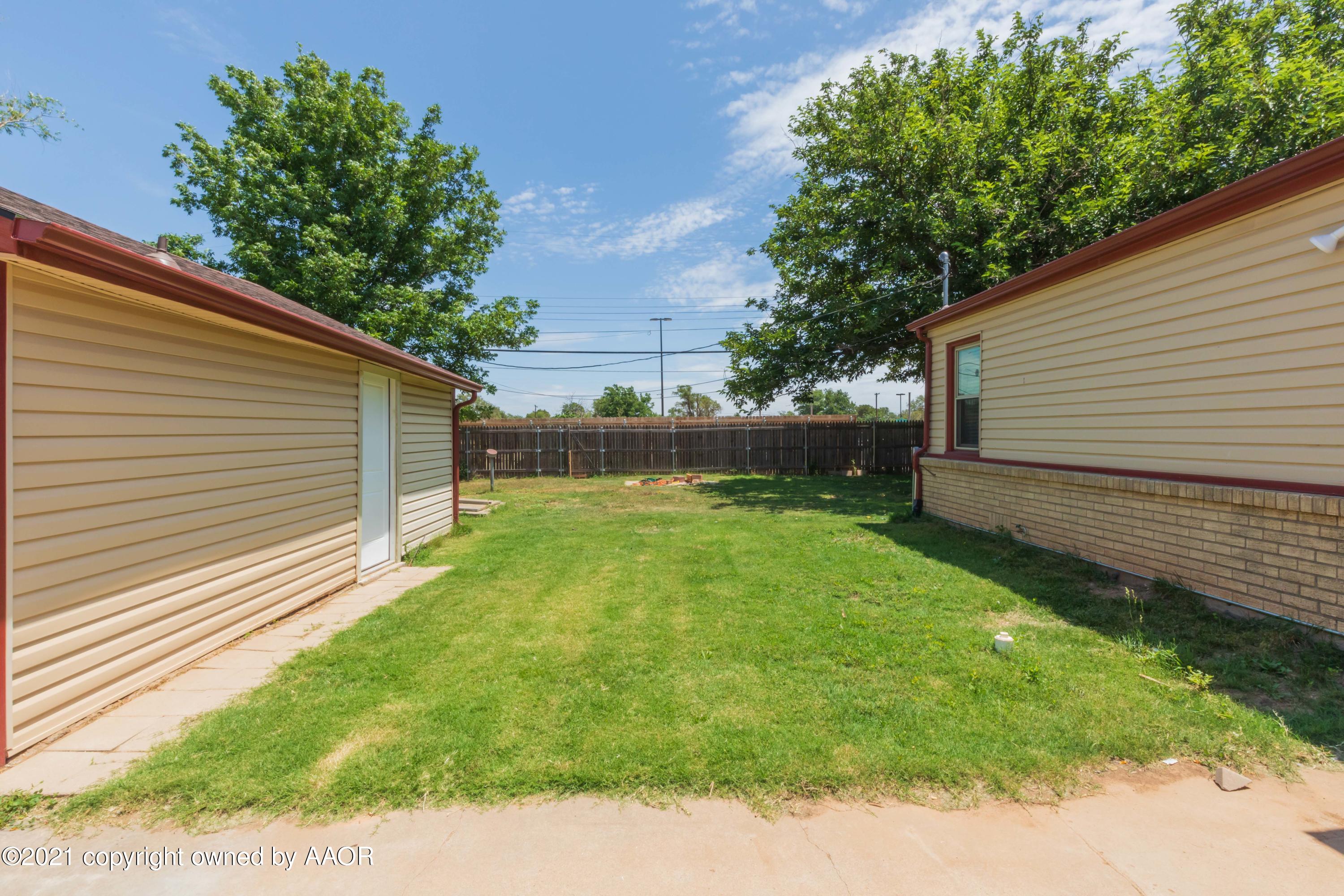 3817 South Hughes Street Amarillo, TX 79110 - Photo 34 of 36 a view of a backyard with a garden