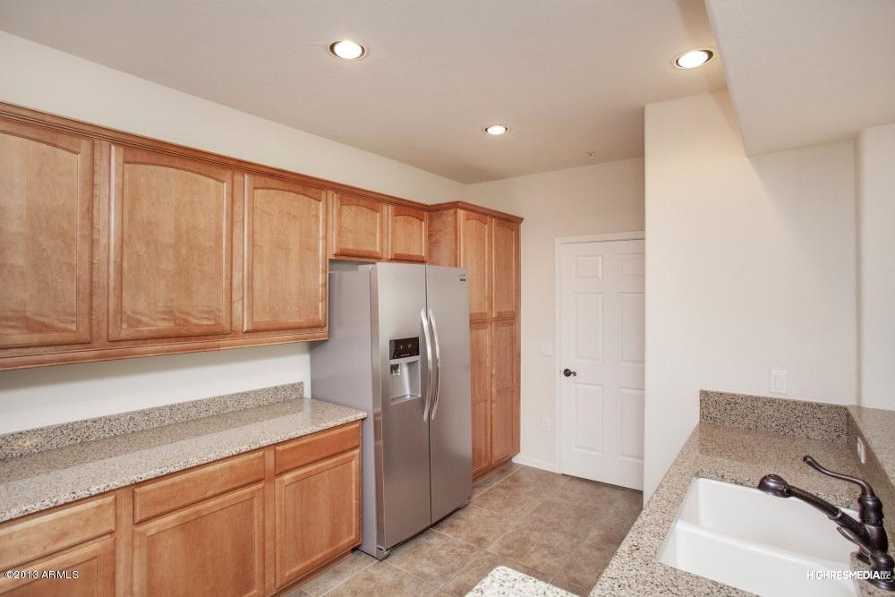 3935 East Rough Rider Road, Unit 1068 Phoenix, AZ 85050 - Photo 11 of 25 Kitchen3