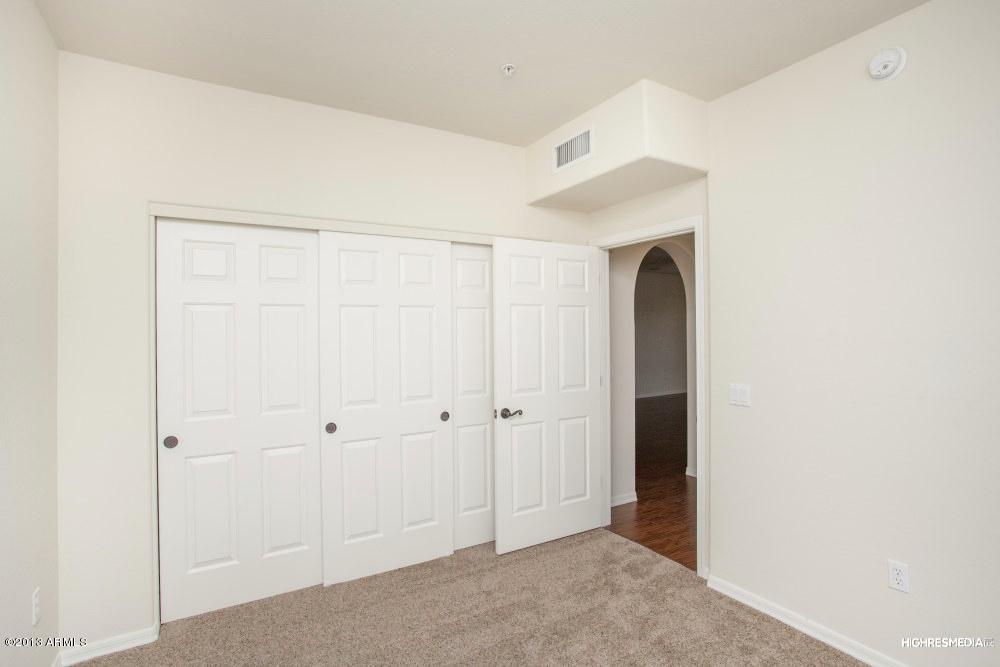 3935 East Rough Rider Road, Unit 1068 Phoenix, AZ 85050 - Photo 21 of 25 Bedroom 2