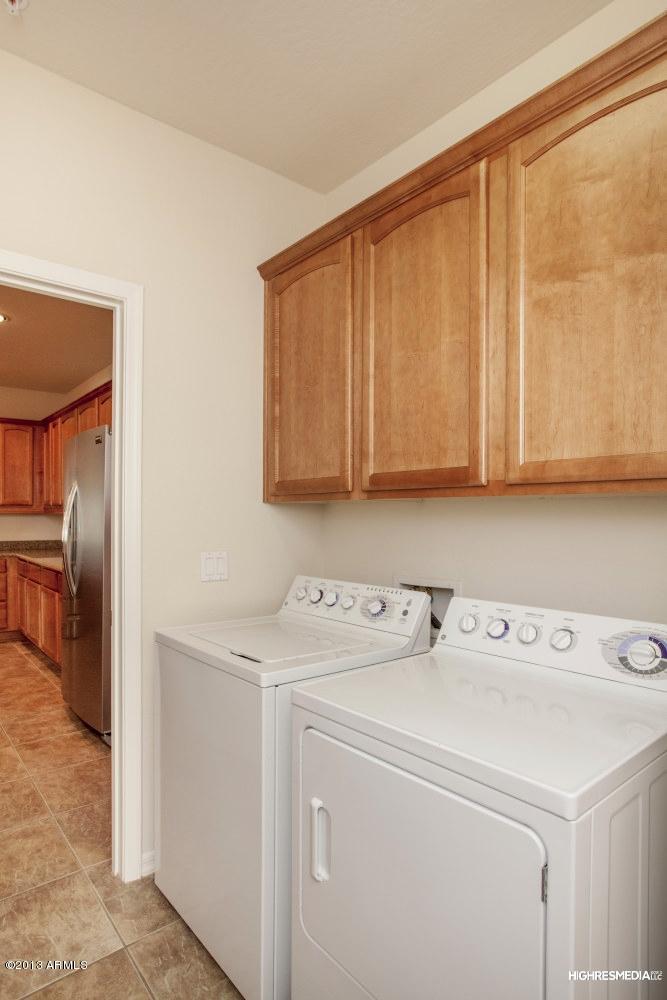 3935 East Rough Rider Road, Unit 1068 Phoenix, AZ 85050 - Photo 23 of 25 Laundry Room