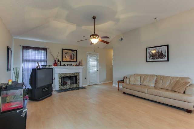 2141 Spring Hill Circle Spring Hill, TN 37174 - Photo 2 of 14 Enjoy gathering around the fireplace and in this great room for watching sporting events with your friends and family.