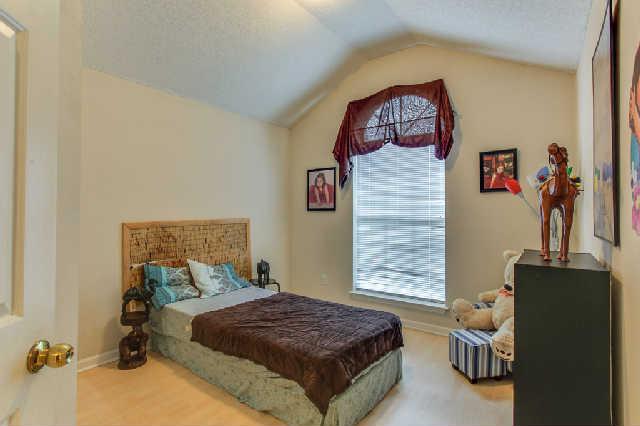2141 Spring Hill Circle Spring Hill, TN 37174 - Photo 6 of 14 Bedroom with vaulted ceiling