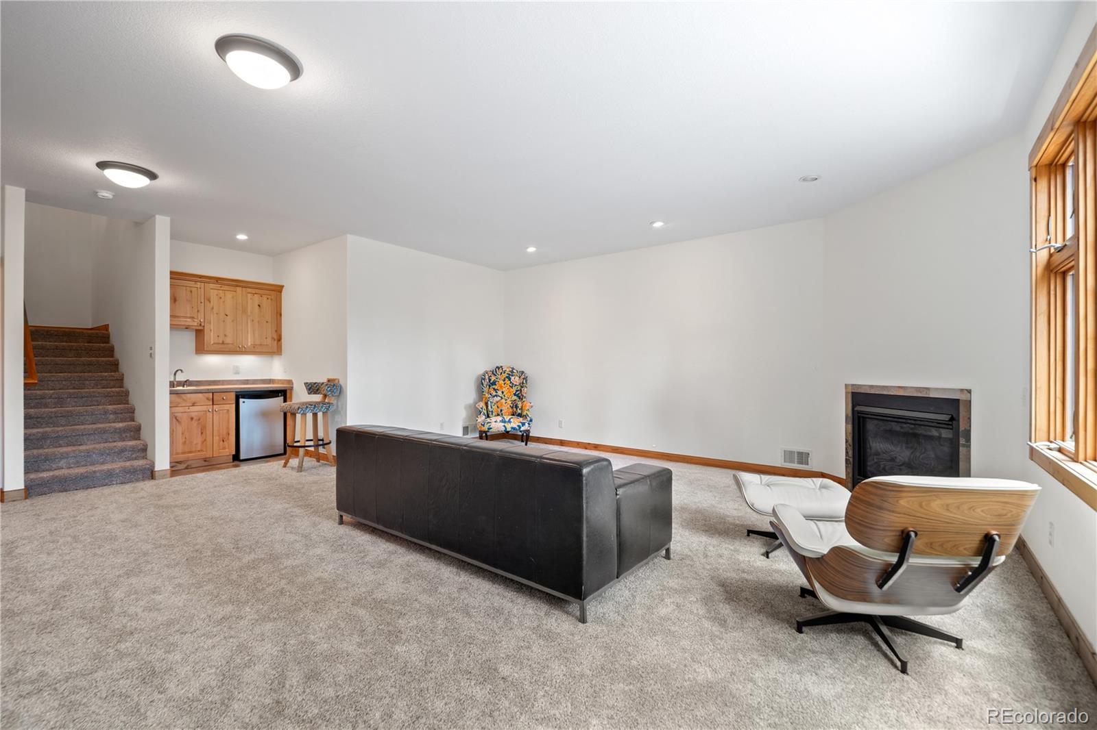 27711 Moffat Road Evergreen, CO 80439 - Photo 20 of 30 a living room with furniture